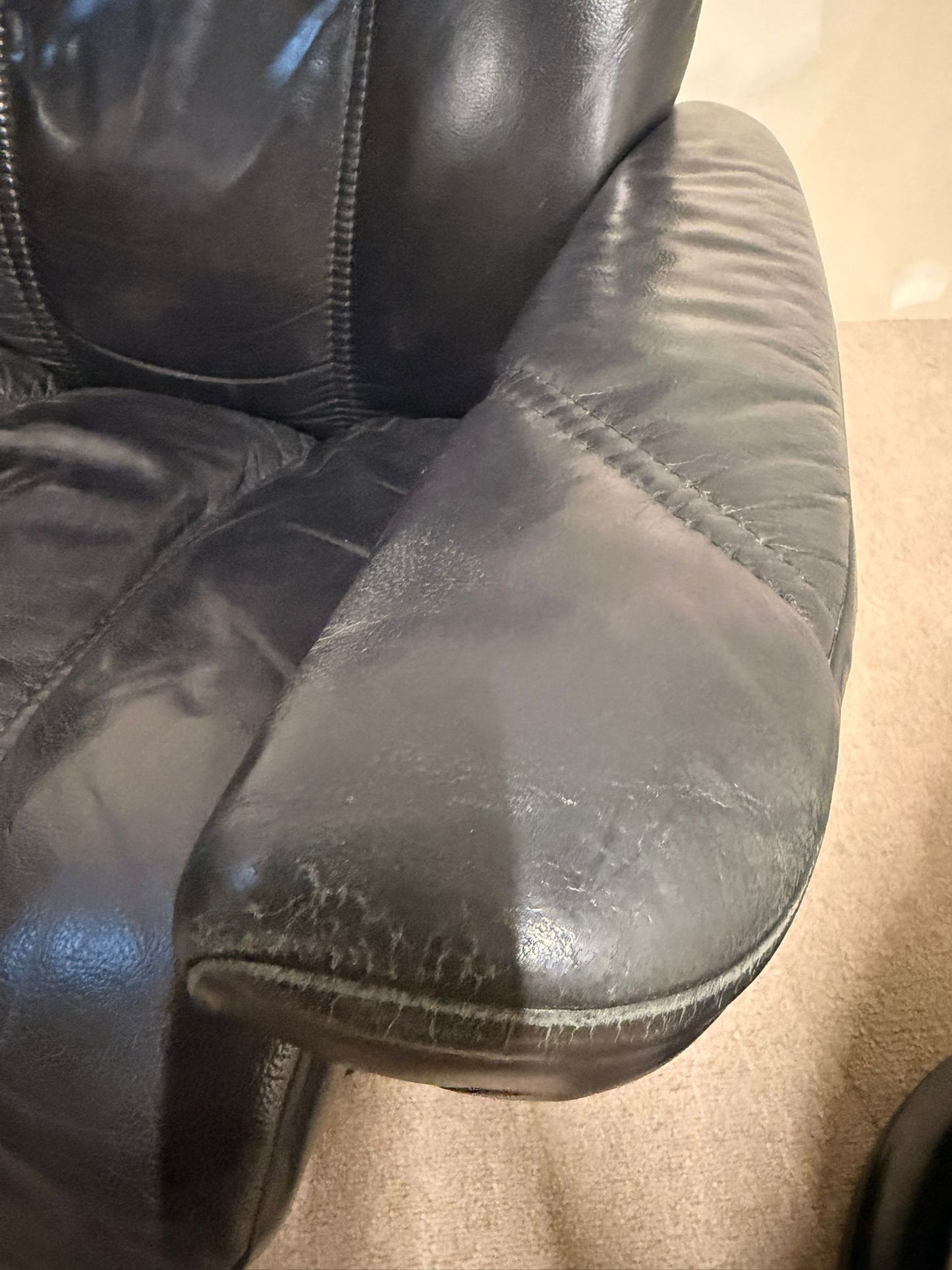 Stressless Consul Relaxsessel mit Hocker aus Leder, schwarz