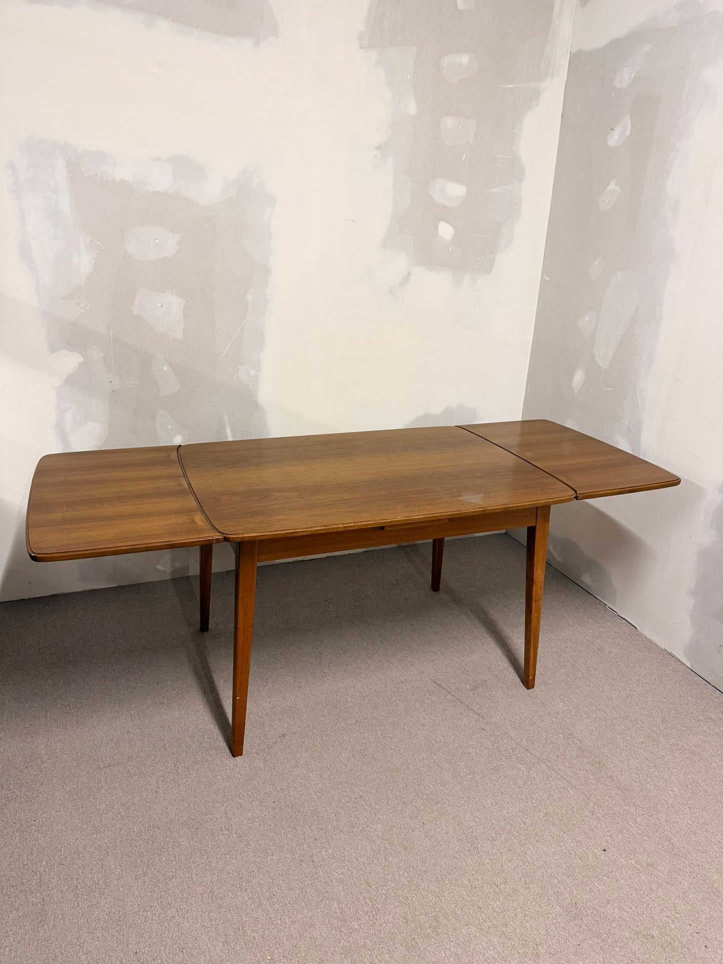 Mid Century Esstisch aus Teakholz mit Plattenauszug