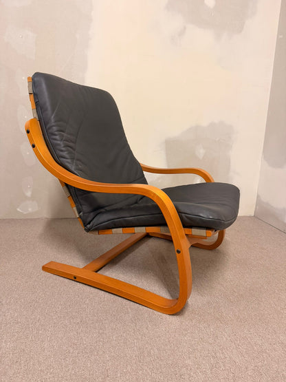 Schwedischer Schwingsessel Relaxsessel aus Leder in Grau
