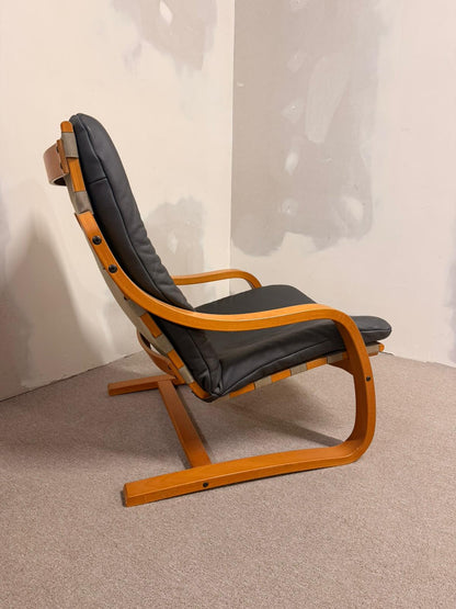 Schwedischer Schwingsessel Relaxsessel aus Leder in Grau